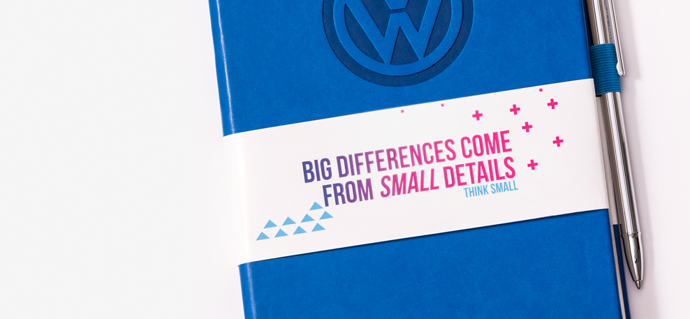 Printed Bellyband on a blue faux leather Wolkswagen notebook