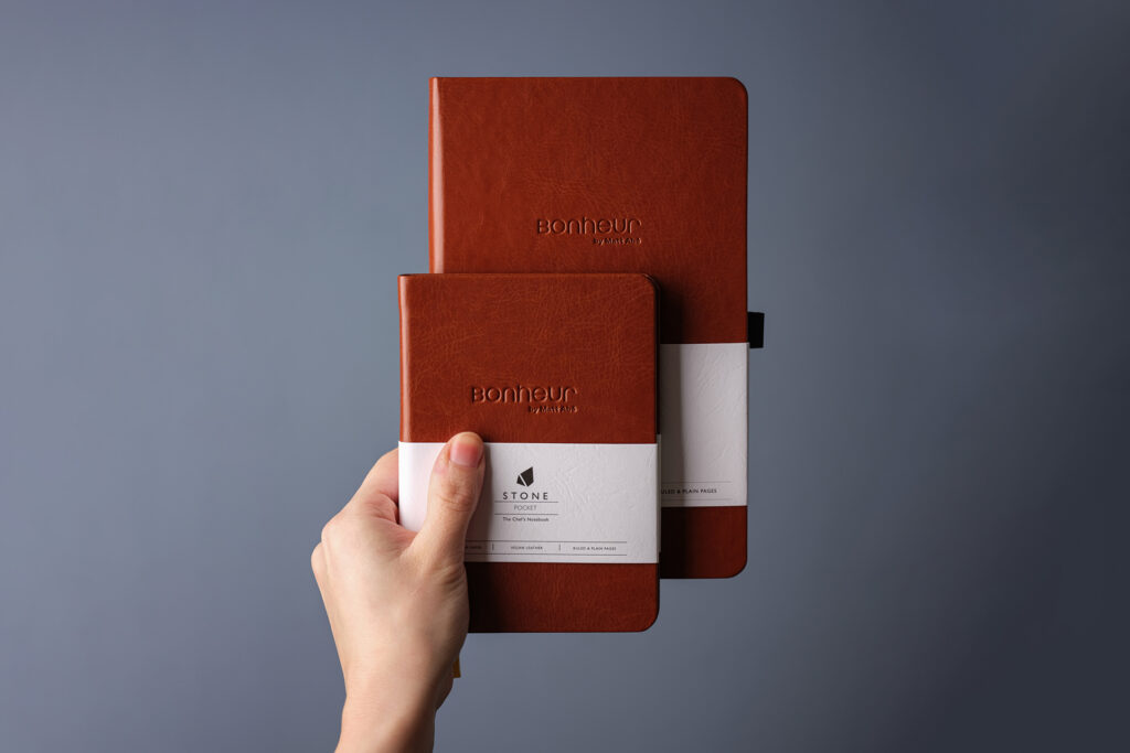 Customised stone journal notebooks with debossed logos - stone pocket and stone classic
