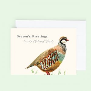 Customisable Christmas greeting card with a Partridge in the grass.
