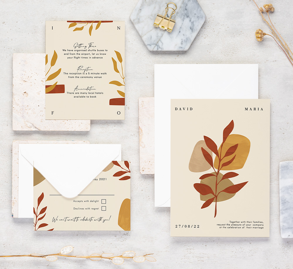 Leaves and stones rustic wedding invitation suite in cream, orange and beige colours