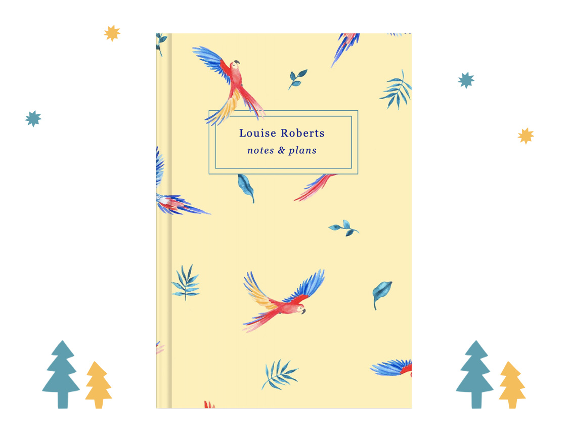 Flying Parrots notebook with decorative Christmas trees and stars in blue and yellow