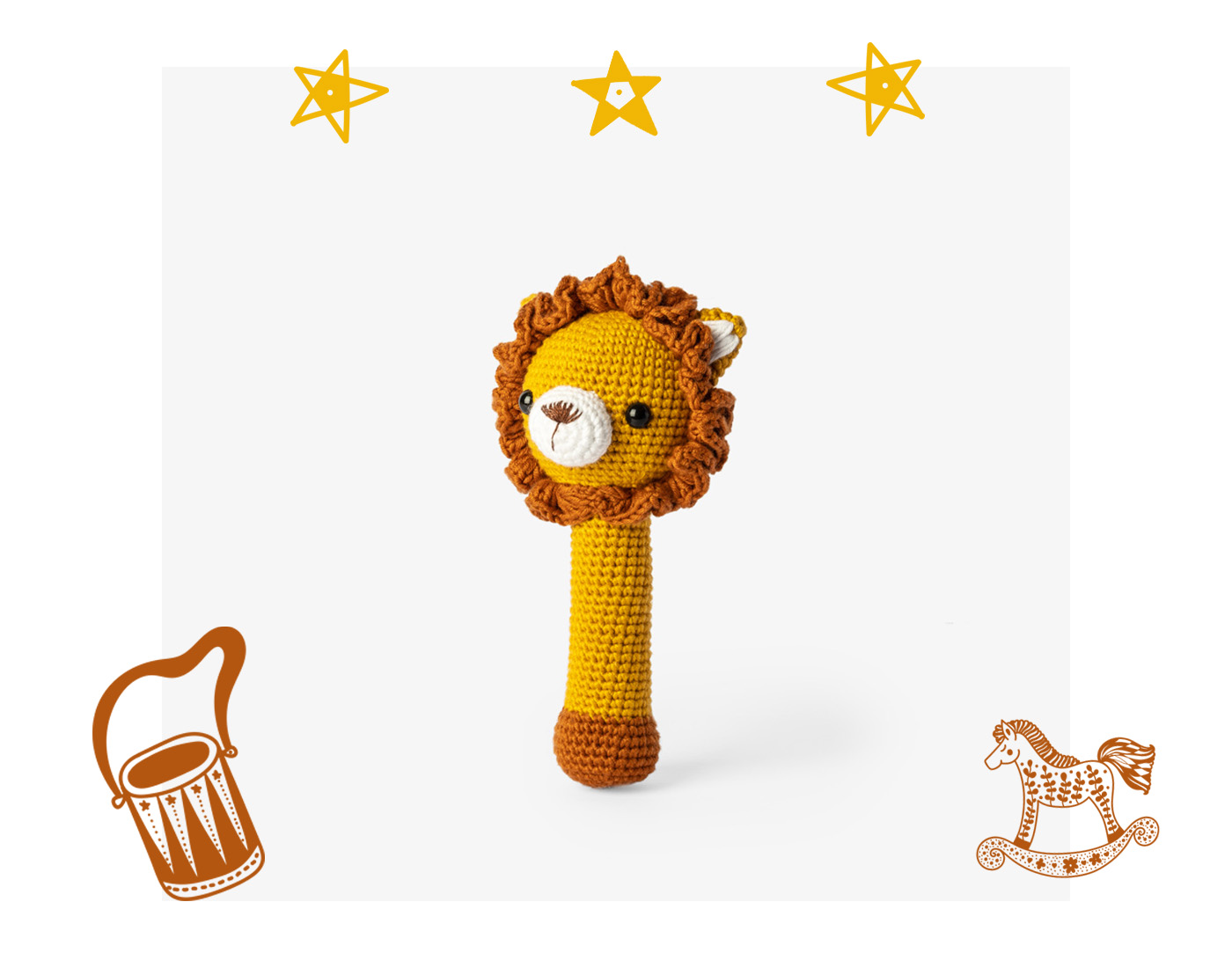 Lion Rattle with decorative yellow stars and a brown drum and rocking horse illustrations