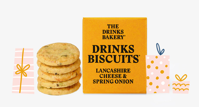 Lancashire Cheese & Spring Onion Biscuits with pink illustrated christmas present decorations