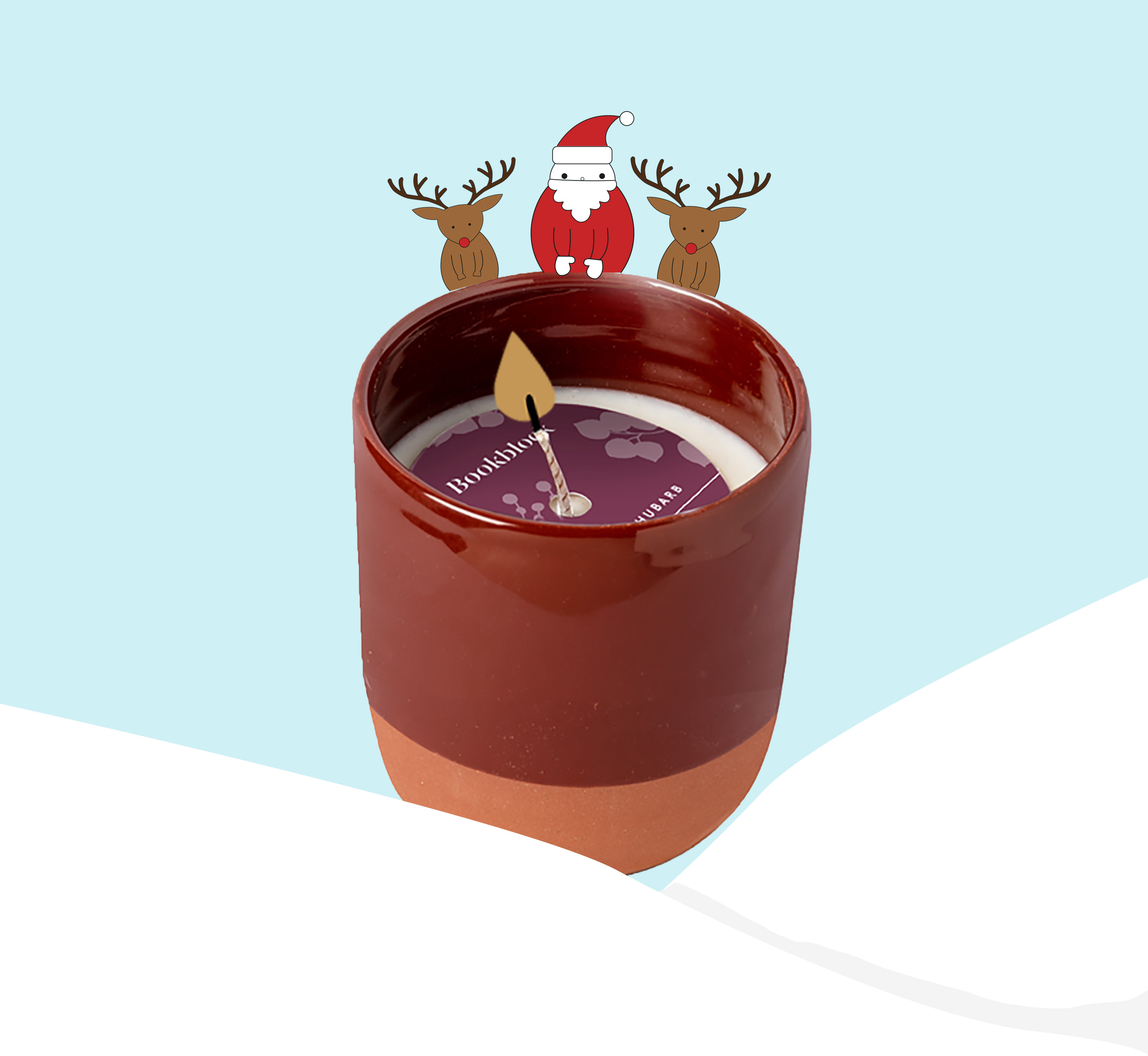 Plum and Rhubarb Candle with Santa and Reindeer illustrations and snow hills